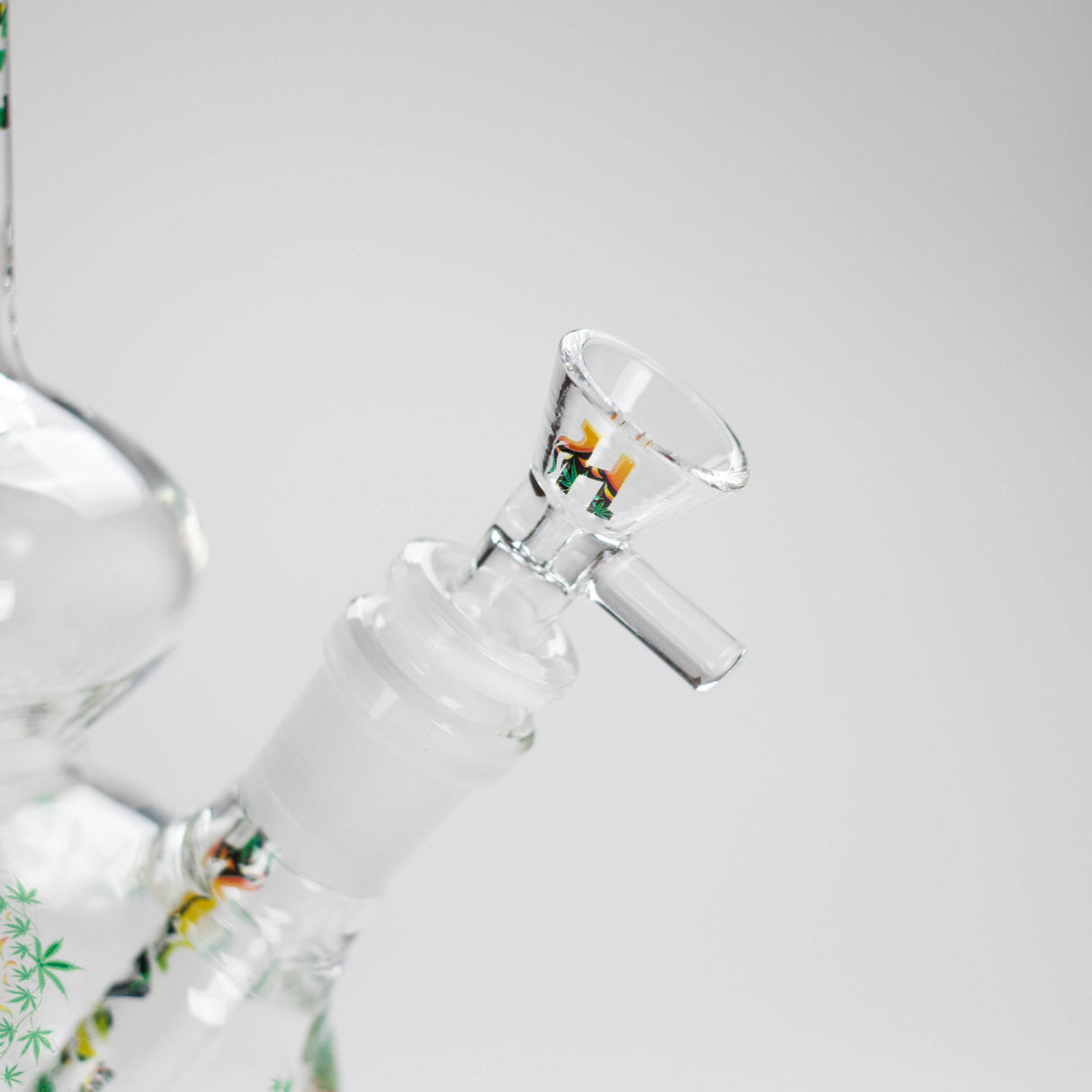 Haze | 9″ Heart Leaf Double Bubble Base Glass Bong with Color Lip – Amber (Mini-U)